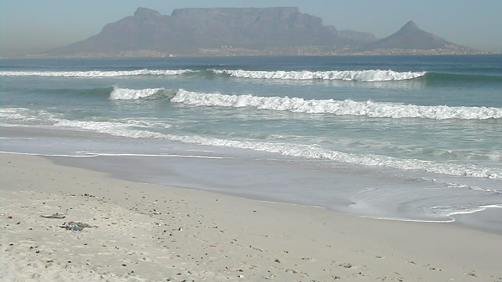 Rovos Rail luxury train crossing African landscape, romantic honeymoon journey through South Africa